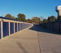 a row of blue and white shipping containers