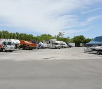 a group of vehicles parked in a parking lot