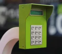 a green phone on a table