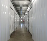 a long hallway with white walls