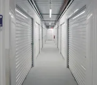 a long hallway with white walls