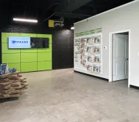 Modern interior space featuring Midgard branding and organized product displays.