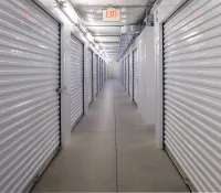 a long hallway with several computer servers