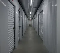 a long hallway with rows of computer servers