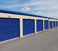 a row of blue doors