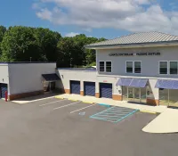 a building with a pool in front