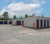 a row of blue and red containers