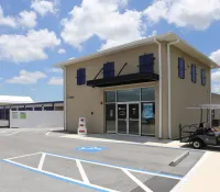 a building with a parking lot