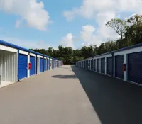 a row of white and blue buildings