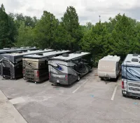 a group of trucks parked in a parking lot