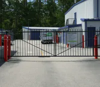 a gated off area with a bus parked in it