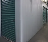 a hallway with white lockers