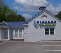 a white building with blue lettering