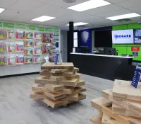 a room with shelves of wood