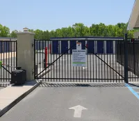 a gate with a sign on it