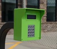 a green and white telephone booth