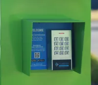 a green box with a white and blue screen