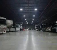 a group of vehicles parked in a large room