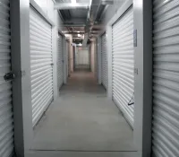 a hallway with white lockers