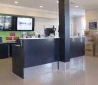 a large office with a counter and boxes