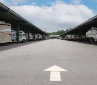 a group of rvs parked at a gas station