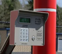 a parking meter on a pole