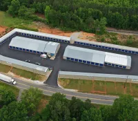 a large building with a parking lot