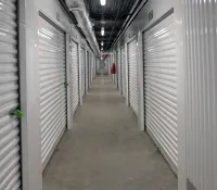 a long hallway with rows of computer servers