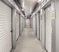 a long hallway with several computer servers