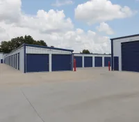 a group of blue and white garages