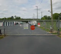 a stop sign on the side of a road