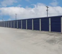 a row of blue and white shipping containers