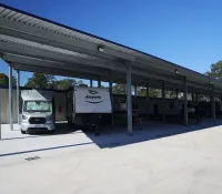 a truck parked at a gas station