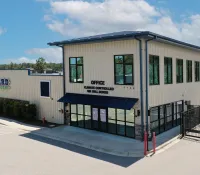 a building with a blue awning