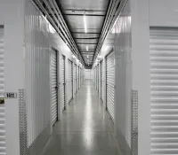 a long hallway with white walls