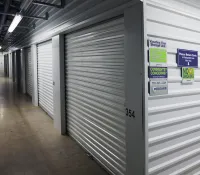 a hallway with white lockers