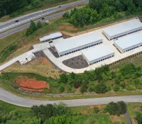 a large building with a parking lot