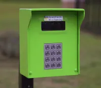 a green and black telephone