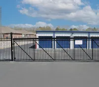 a metal fence with a metal gate