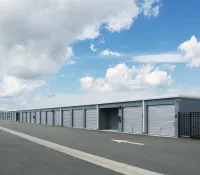 a row of garages on a road