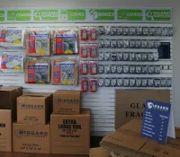 a shelf with boxes and boxes