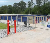 a construction site with a blue fence