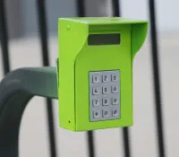 a green and white telephone