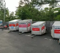 a group of white and red containers