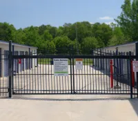 a gate with signs on it