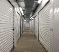 a long hallway with many doors