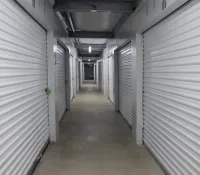 a long hallway with white walls