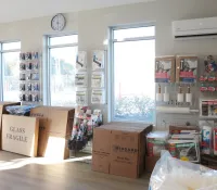 a room with boxes and shelves