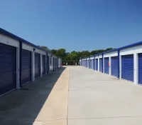 a row of white and blue buildings