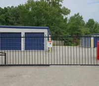 a train station with a fence